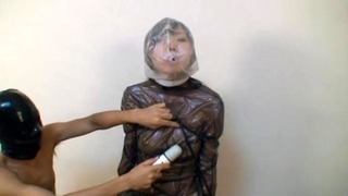 Japanese Girl in Mac and Plastic Breathplay