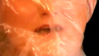 Masturbating Slave With Plastic Bag In Her Head