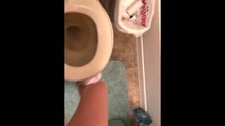 Petite Sabrina Pulls Her Thong to the Side and Pees in the toilet