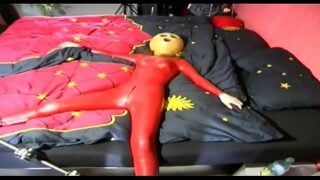 Fetish Depravation For A Red Latex Dressed Slave