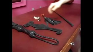Wild Brunette In Red Latex Lingerie Ties Up Slutty Chick And Spanks Her Yummy Ass With A Whip